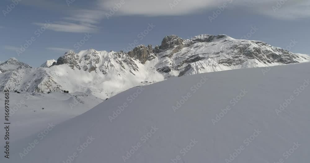 aeria view of beautiful winter nature landscape mountains covered with fresh snow at beautiful sunny day fly over peaks aeria view of beautiful winter nature landscape mountains covered with fresh snow at beautiful sunny day fly over peaks