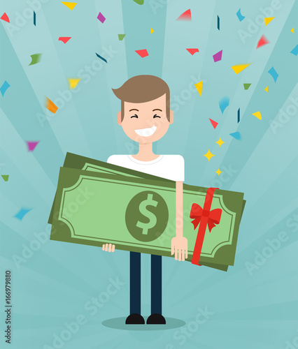 Young brunette guy really happy enjoying and holding huge gift pack of green money/dollars with both hands. Win in a lottery concept