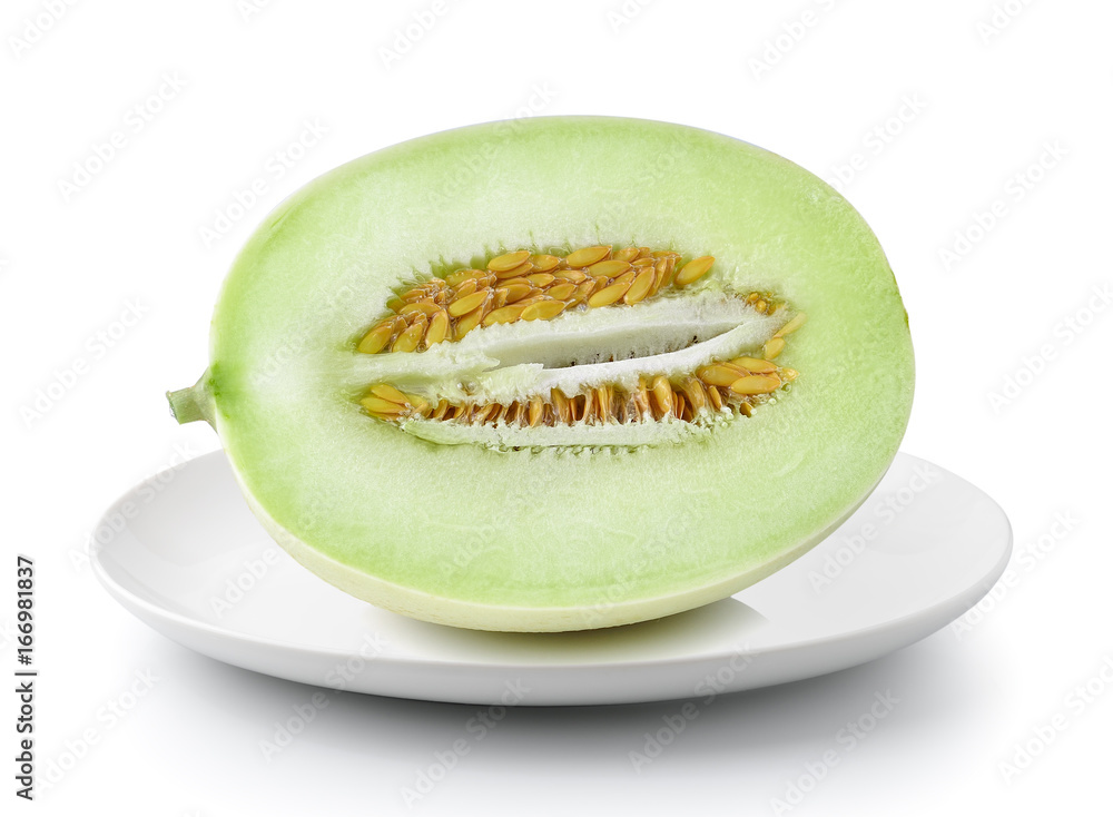 cantaloupe melon in plate isolated on a white background cantaloupe melon in plate isolated on a white background