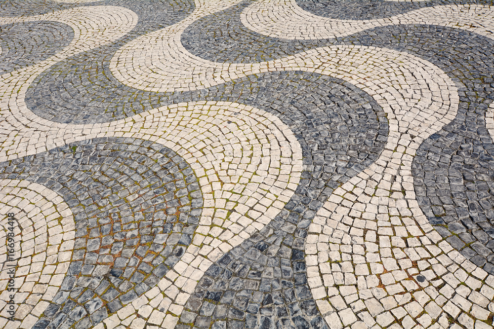 Detail of a cobblestone pavement - Lisbon, Portugal. Detail of a cobblestone pavement - Lisbon, Portugal.