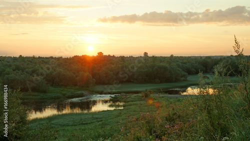 Sunrise, forest, meadow and river