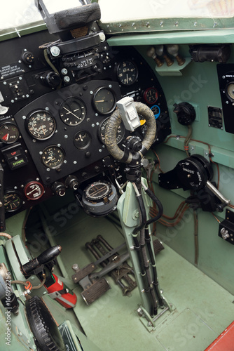morecambe, england, 02/05/2016, The cockpit and controls inside a world war two spitfire british war plane. Thruster, fuel dials and direction control.