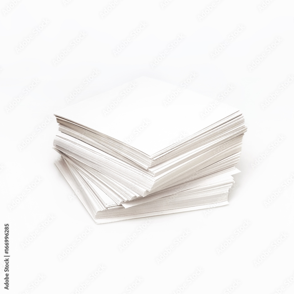 A pack of blank paper on a white background for presentation of a design project to a customer A pack of blank paper on a white background for presentation of a design project to a customer