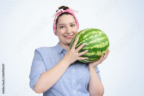 Portrait young happy girl with watermelon