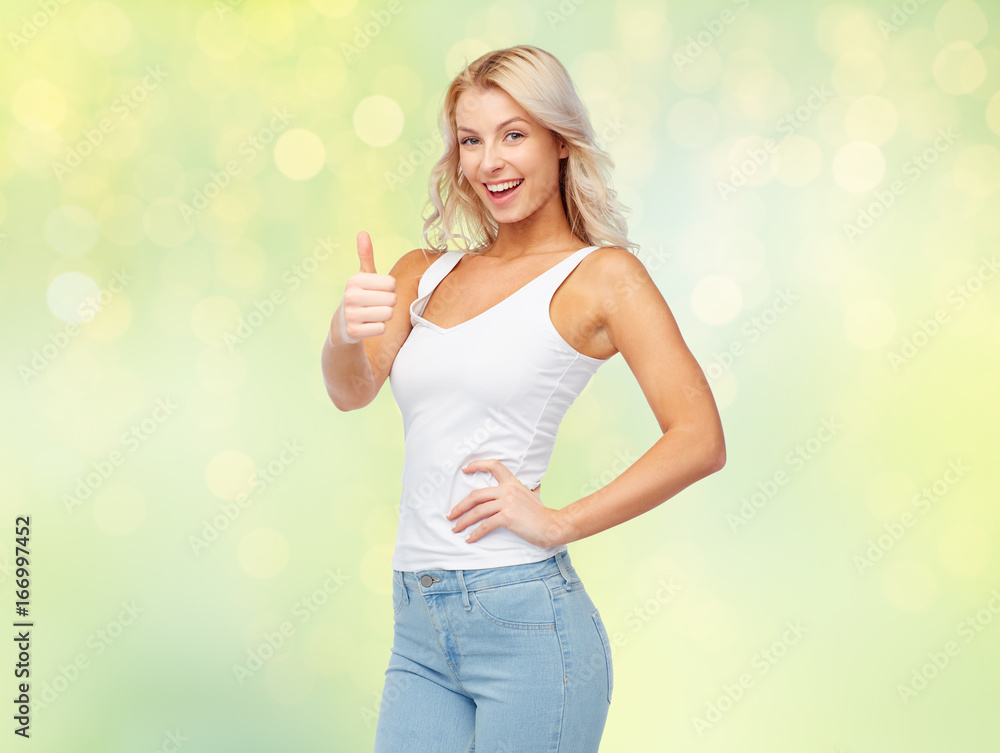 happy young woman showing thumbs up happy young woman showing thumbs up