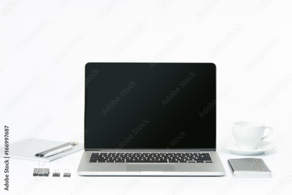 The front view of notebook and cup of coffee. Inspiration and mock-up concept The front view of notebook and cup of coffee. Inspiration and mock-up concept
