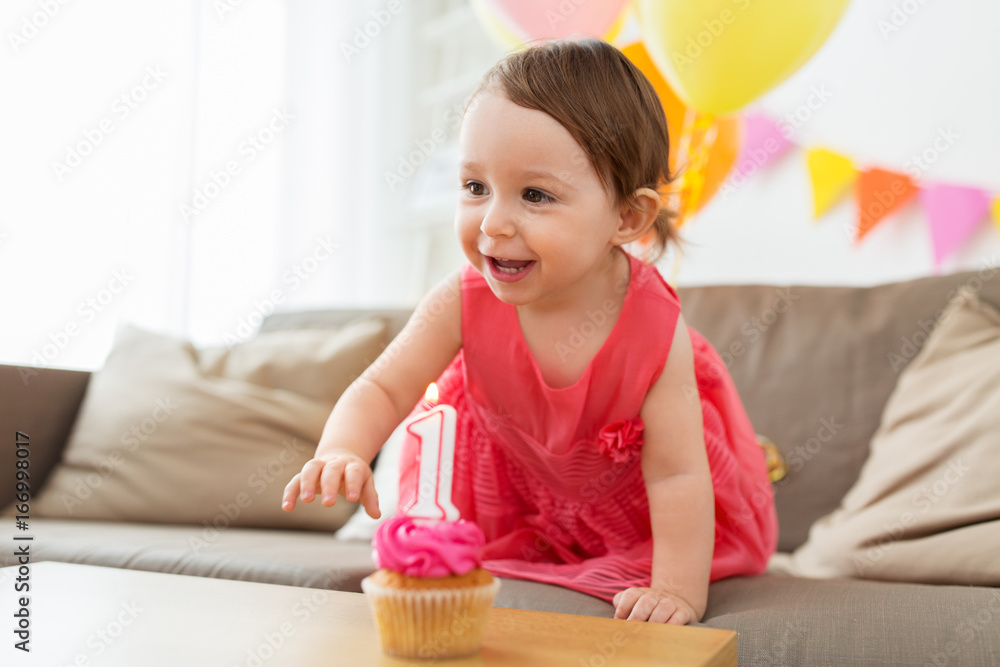 baby girl with birthday cupcake at home party baby girl with birthday cupcake at home party