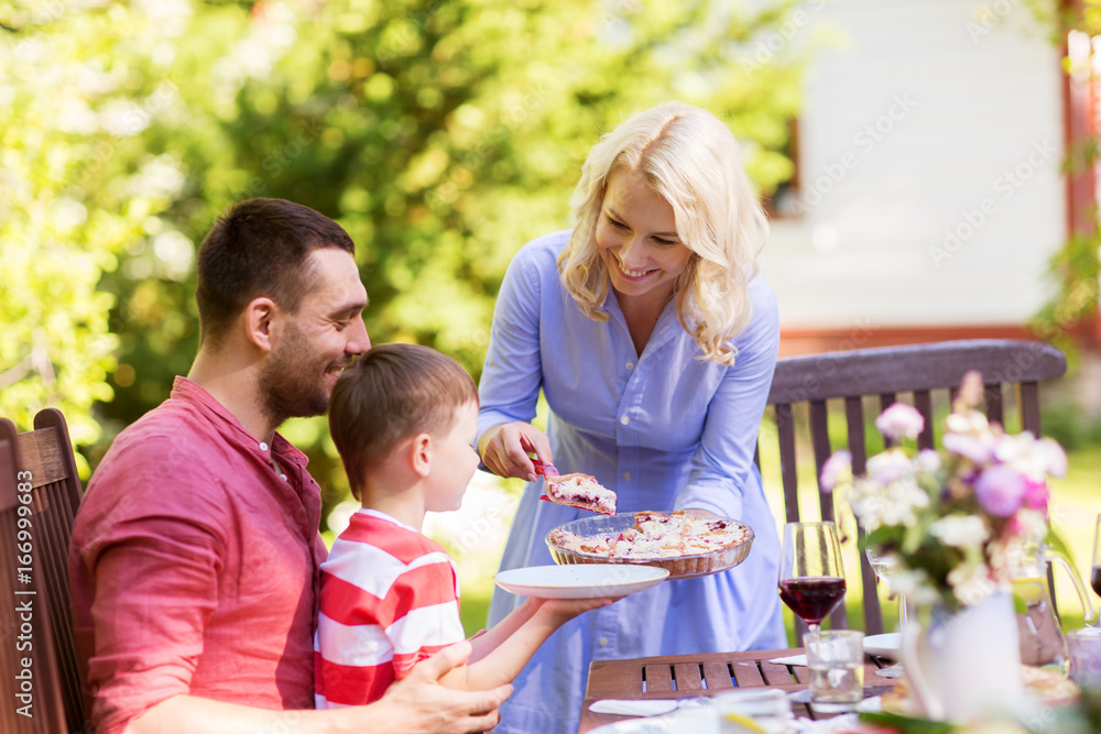 happy family having dinner or summer garden party happy family having dinner or summer garden party