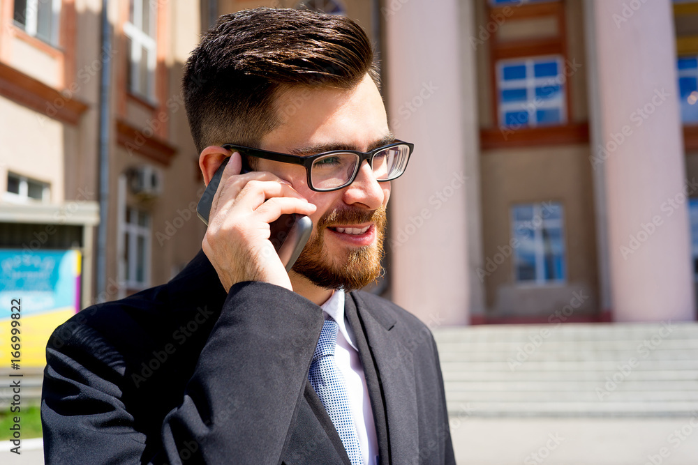 Businessman is talking on phone Businessman is talking on phone