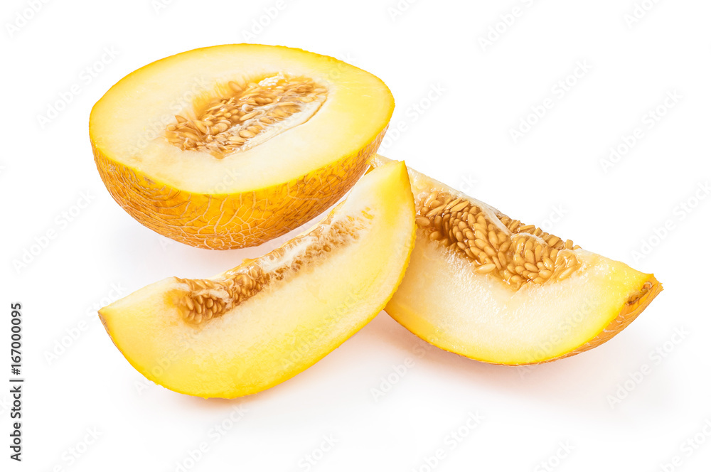 Slices of ripe yellow melon with seeds, on white background