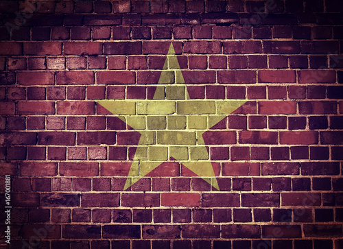 Grunge Vietnam flag on a brick wall