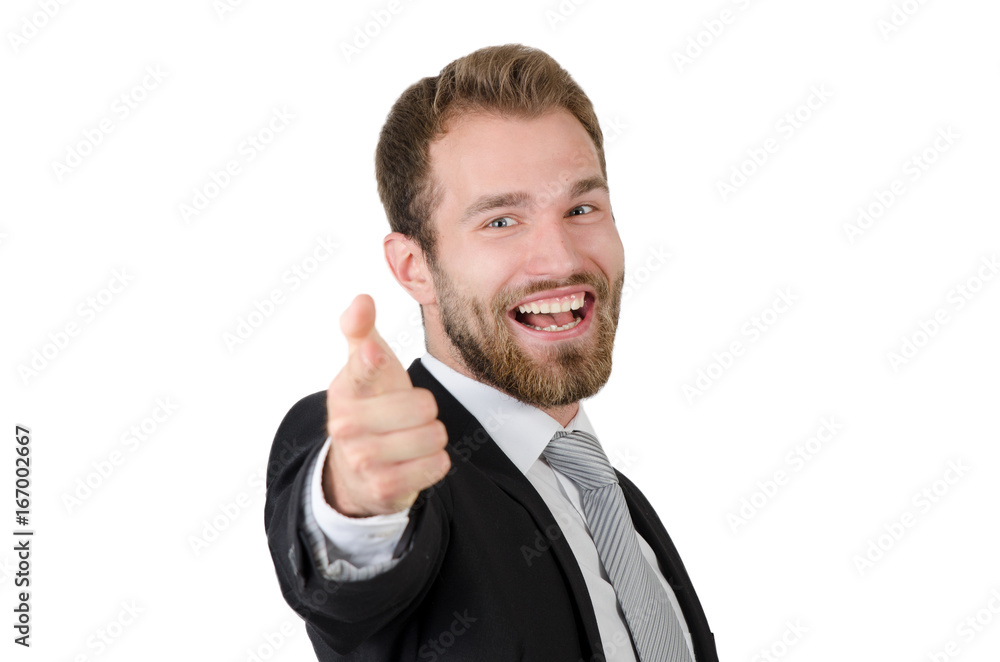 Handsome young business man pointing at you and smiling Handsome young business man pointing at you and smiling