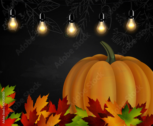 Chalkboard with autumn leaves and pumpkin