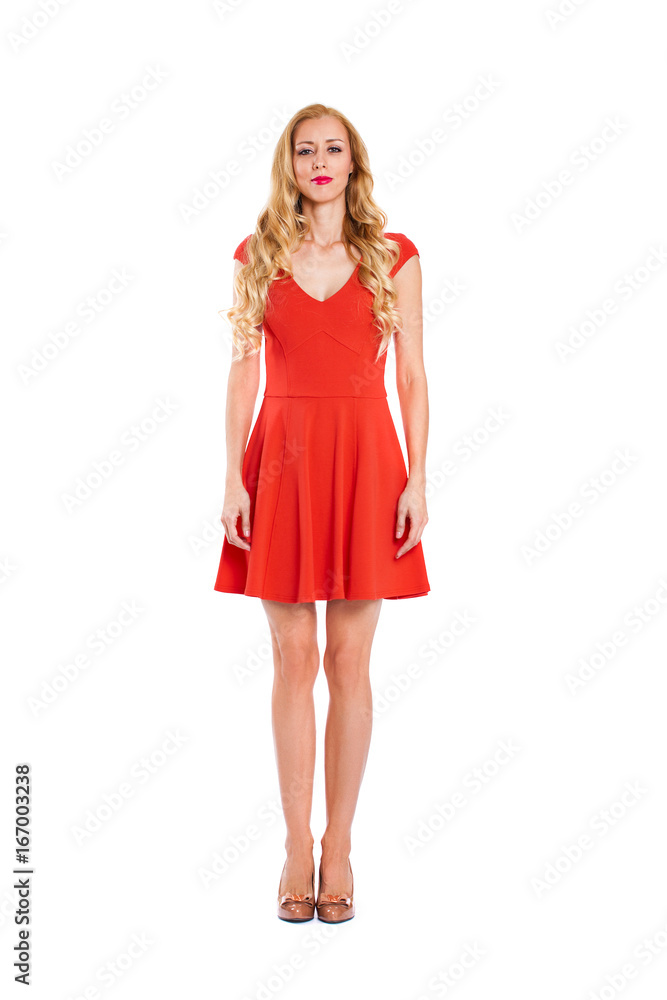 Young beautiful happy blonde woman in red dress Young beautiful happy blonde woman in red dress
