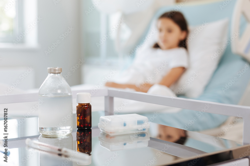 Selective focus of bottles with medicine