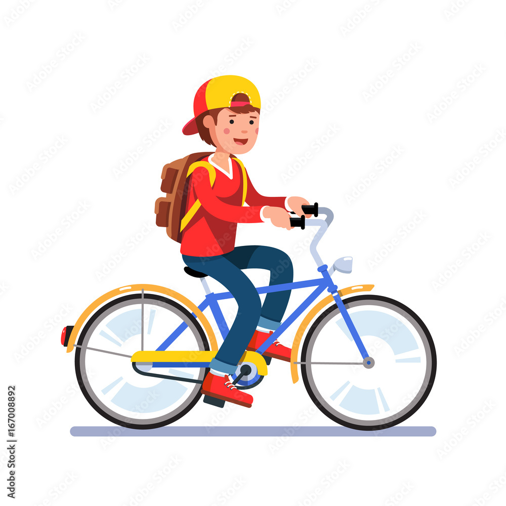 Teen school boy cycling on bicycle with backpack Teen school boy cycling on bicycle with backpack
