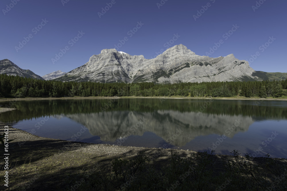 Reflections of Mount Lorette at Kananaskis Provencal Park, Alberta, Canada