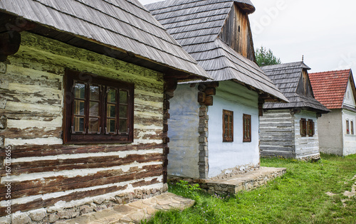 Wooden cottages in village, Slovakia photo