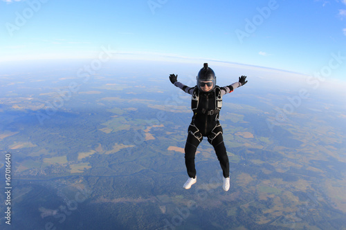Skydiver girl in the sky