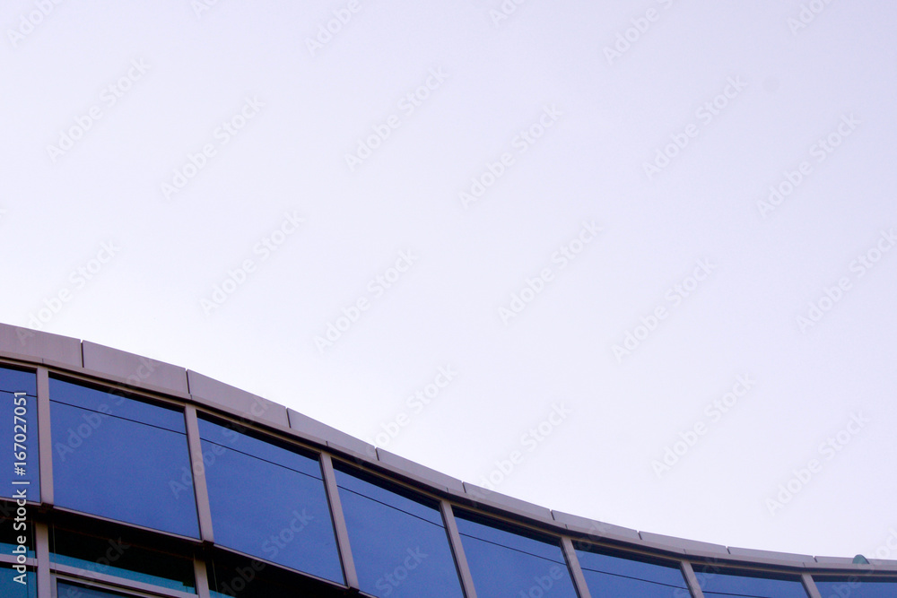 Fototapeta premium Office building against a blue sky