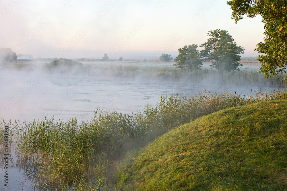 Fototapeta premium Morning mist over the river