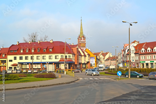 KENTShIN, POLAND. Pawel John II Square with prospect at a spike of a church of St. Katarzhina