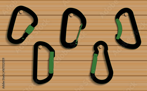 Vector Climbing carabiners set on wooden background