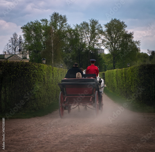 Carriage. Dust roads. © Svetlana
