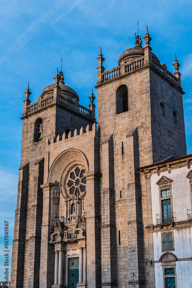 Porto Cathedral (Se do Porto) or Cathedral of Assumption of Our Lady in historical centre of city of Porto. Se Cathedral was built in 12th century by Bishop Hugh. Portugal. Sunset.
