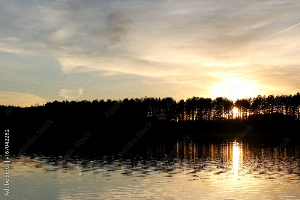 View of the lake in sunset time View of the lake in sunset time