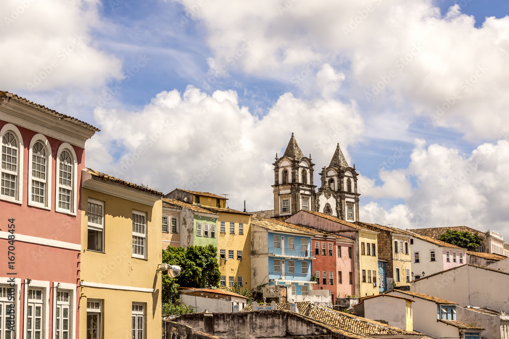 Colonial houses and the cloudy sky