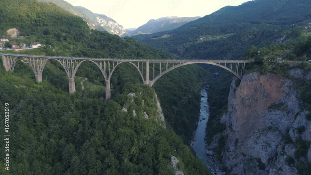 Aerial view of Durdevica Tara arc bridge in the mountains, One of the highest automobile bridges in Europe. Aerial view of Durdevica Tara arc bridge in the mountains, One of the highest automobile bridges in Europe.