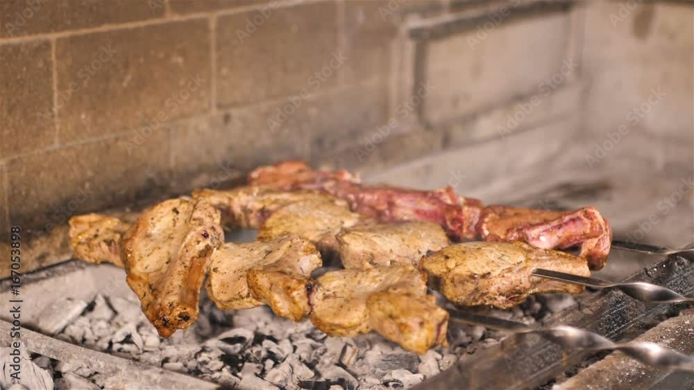Cook roasts juicy kebab barbecue on the grill slowmotion hd Cook roasts juicy kebab barbecue on the grill slowmotion hd