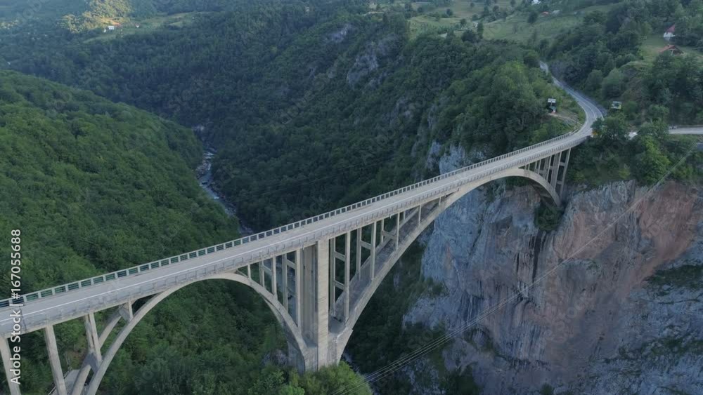Aerial view of Durdevica Tara arc bridge in the mountains, One of the highest automobile bridges in Europe. Aerial view of Durdevica Tara arc bridge in the mountains, One of the highest automobile bridges in Europe.