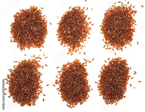 Red rice on white background