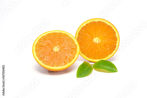 Fresh ripe natural splashing orange juice pour on orange fruit on white backgroundb