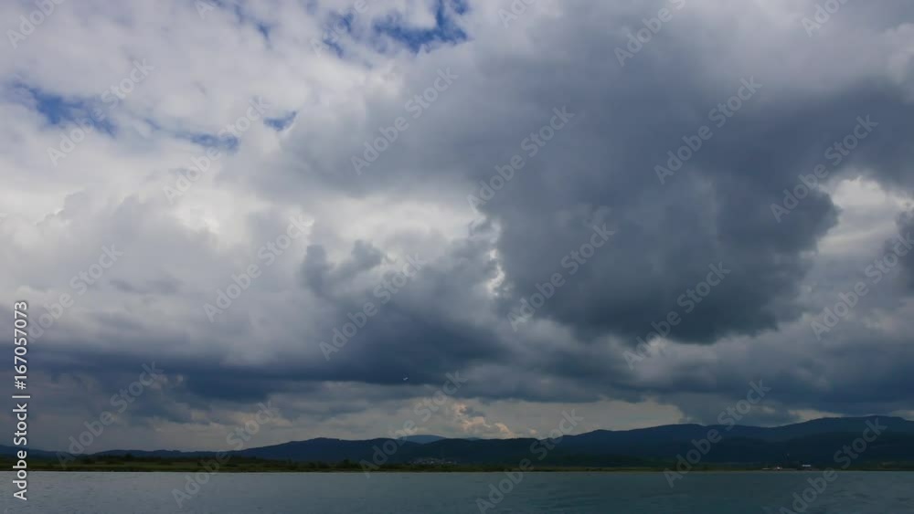 A view of Akyaka coastline (Gulf of Gokova, Mugla, Turkey) on a dark, cloudy spring day. Part of the kiteboard beach can also be seen in the distance.
A view of Akyaka coastline (Gulf of Gokova, Mugla, Turkey) on a dark, cloudy spring day. Part of the kiteboard beach can also be seen in the distance.