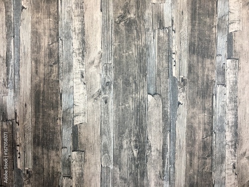 The wall is black./The room is decorated with vintage wood wall./Wood for living room./Wood for interior and exterior For a home that needs vintage./Walls and wood flooring make the home .