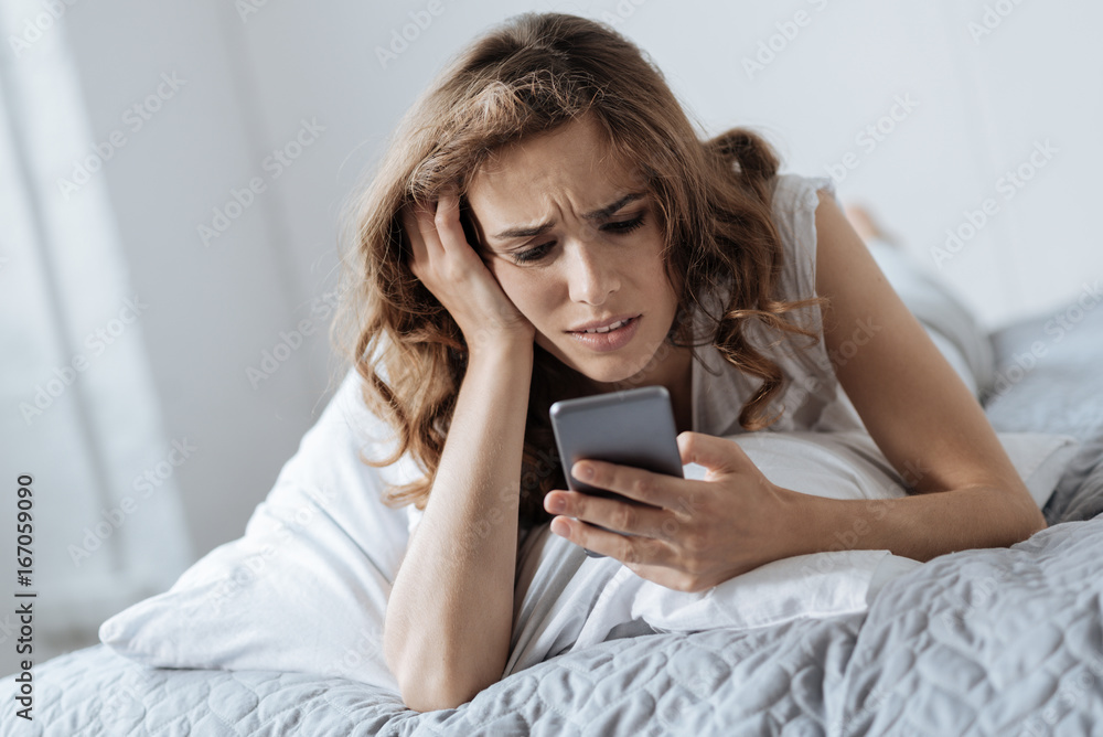 Cheerless attractive woman typing a message Cheerless attractive woman typing a message