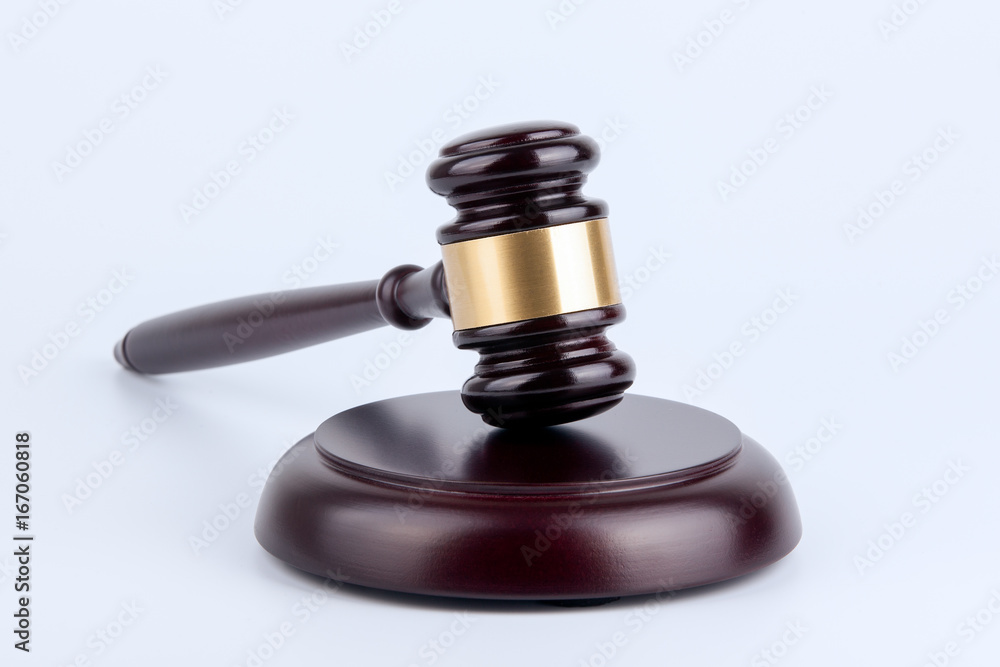 Wooden gavel on a white background. Law and justice concept. Wooden gavel on a white background. Law and justice concept.
