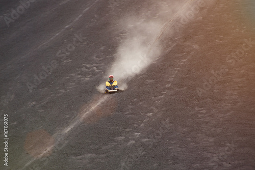 Man ride board on volcano