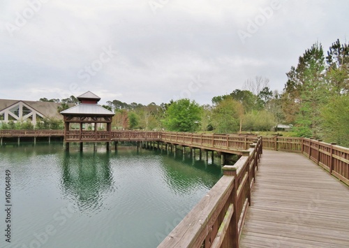 Gazebo and wooden boardwalk over a lake