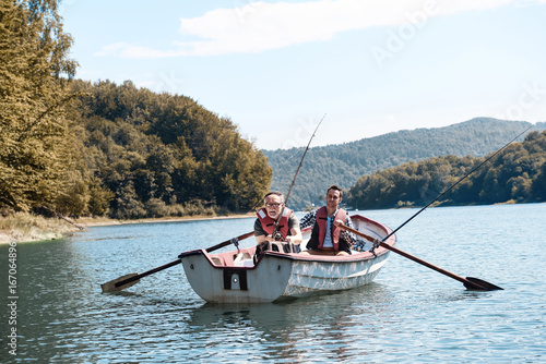 Men spending time in fishery