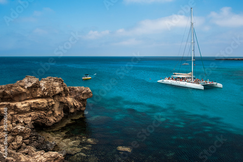 Holiday at the Mediterranean sea. Clean sea water. Beautiful coastline. Blue lagoon. European resort. Cruise travel in Europe. Eurotrip. Cruise tour. Yacht at sea. Trip abroad