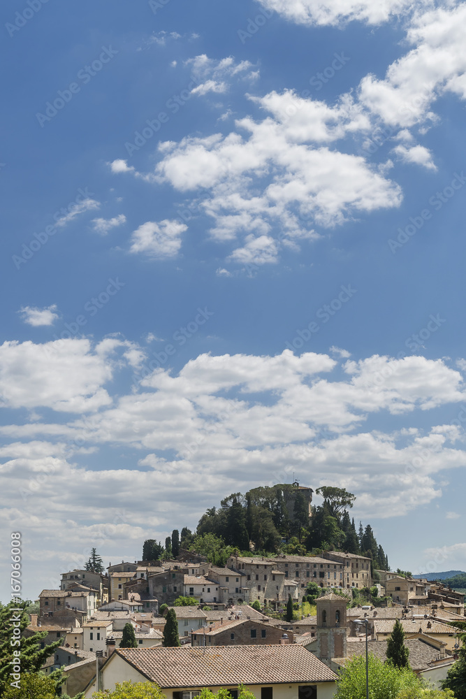 Magnificent view of the ancient hilltop village of Cetona, Siena, Italy, on a beautiful sunny day with some white clouds Magnificent view of the ancient hilltop village of Cetona, Siena, Italy, on a beautiful sunny day with some white clouds