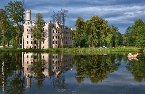 Neo-Gothic style castle surrounded by an English landscape garden in Karpniki, Poland