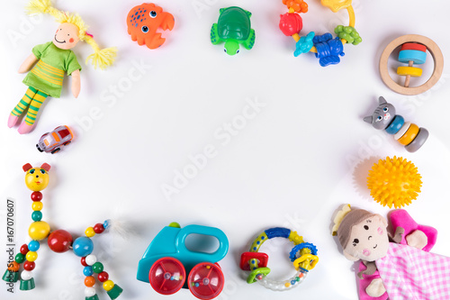 baby toys on white with copy space. top view