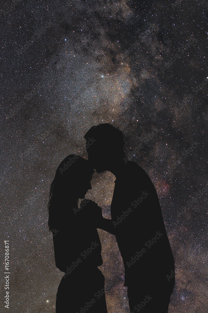 Silhouettes of a young couple under the starry sky. My astronomy work. Silhouettes of a young couple under the starry sky. My astronomy work.