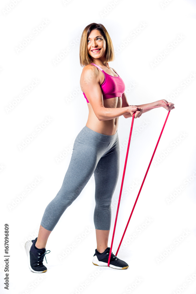 Fitness woman doing exercises with elastic bands Fitness woman doing exercises with elastic bands