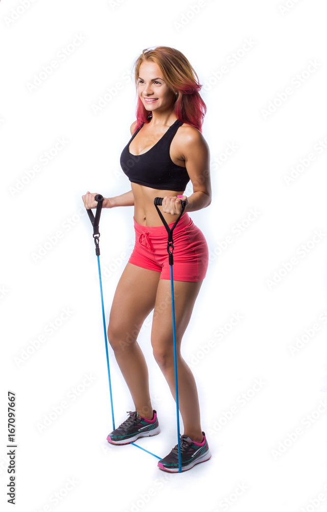 Fitness woman doing exercises with elastic bands Fitness woman doing exercises with elastic bands